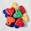 Colorful heart-shaped ceramics with a hole