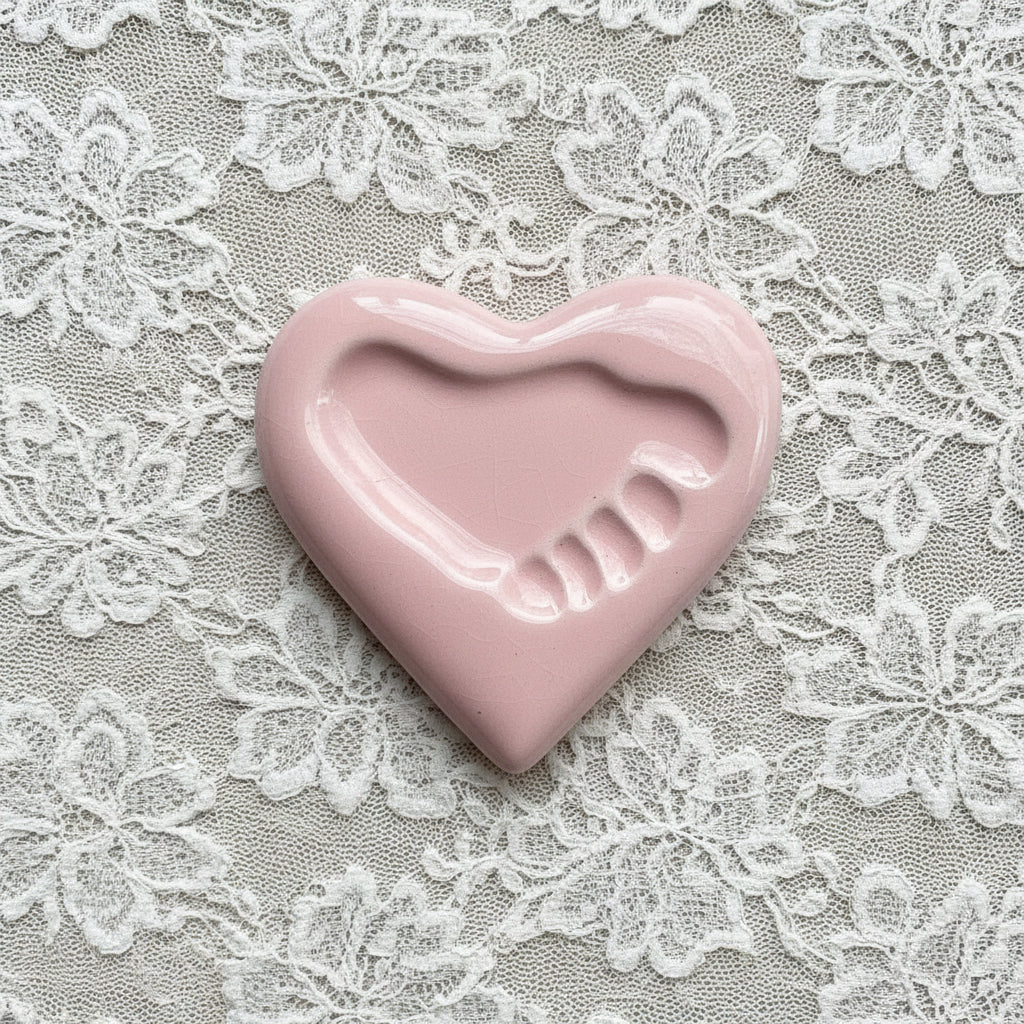 Pink ceramic heart with footprint