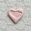 Pink ceramic heart with footprint