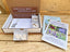 Memory box with items for parents whose child died before birth, including a book and certificate.